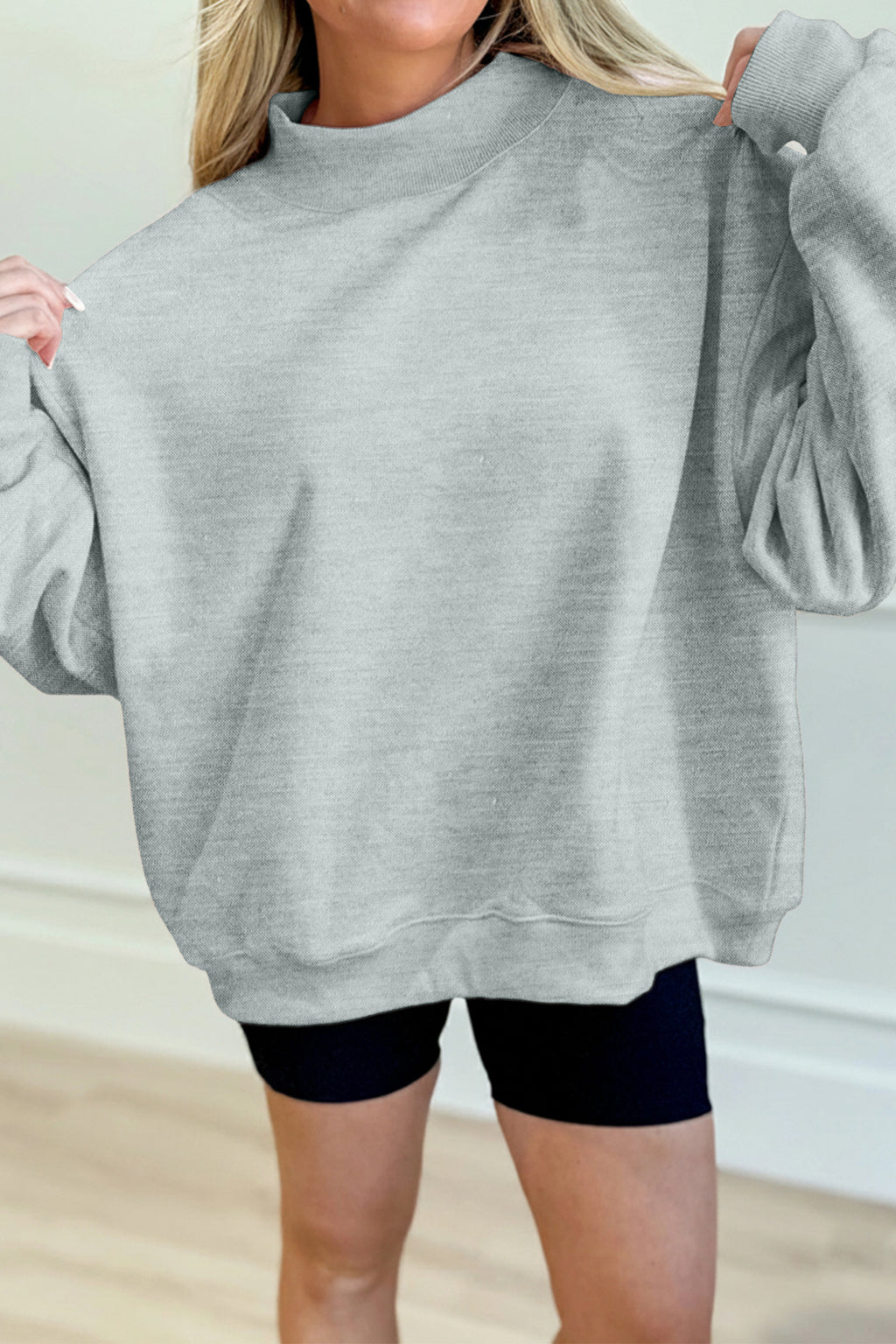 Sweat oversize bleu marine à col montant — style casual chic