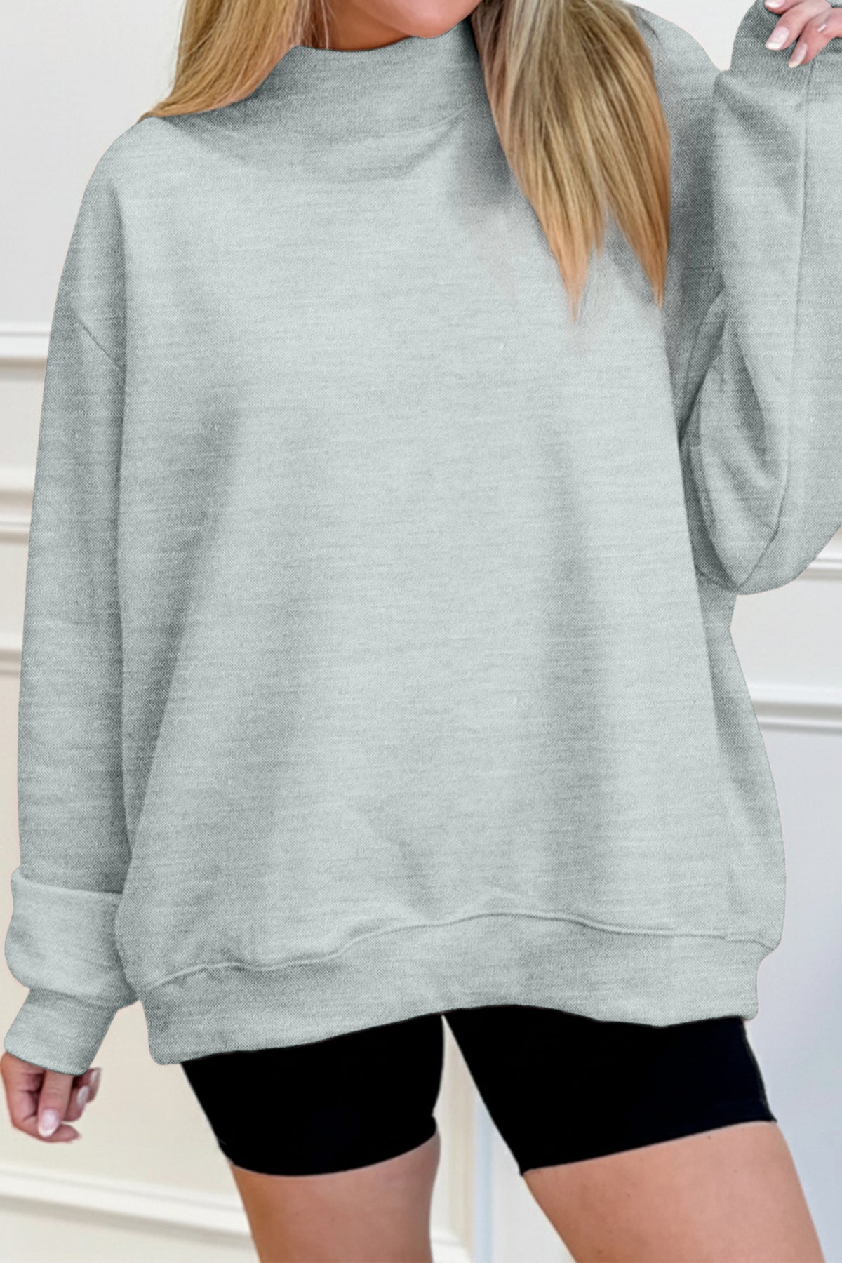 Sweat oversize bleu marine à col montant — style casual chic